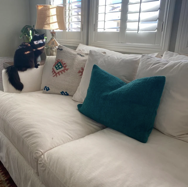 Hemp pillow covers on a white sofa