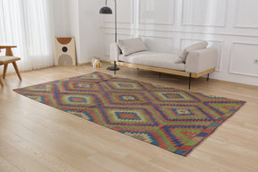 Embrace vibrant design with the Cindy hand-knotted rug. | Kuden Rugs