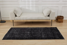 Eileen | Unique Low-Pile Turkish Rug in Sophisticated Black | Kuden Rugs