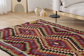 Discover the geometric charm of the Imani vintage rug. | Kuden Rugs