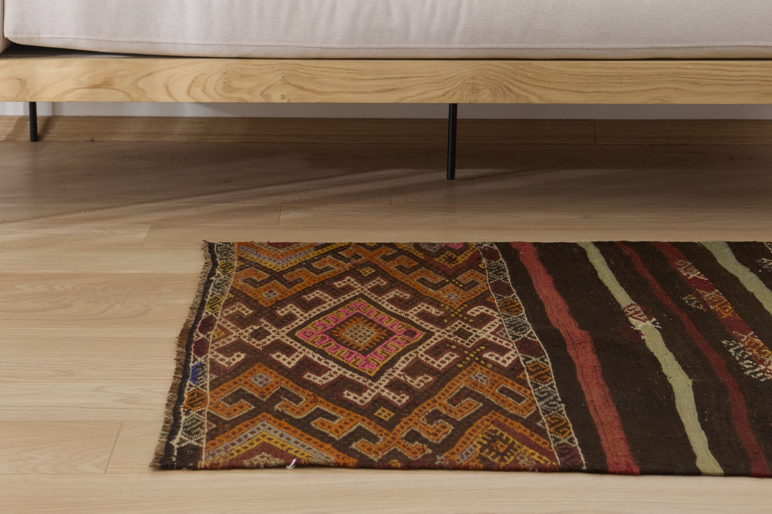 Discover the geometric charm of the Meredith vintage rug. | Kuden Rugs