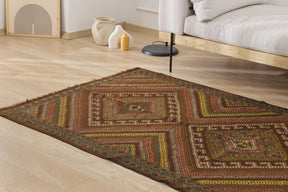 Mireya: An Elongated Turkish Kilim Rug with a Rich Brown Palette | Kuden Rugs