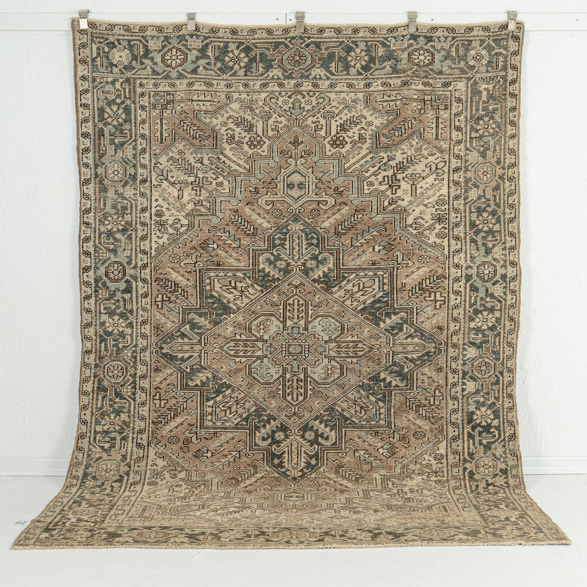 Handmade 6x9 area rug in brown, ideal for a cozy living room, bedroom, dining room