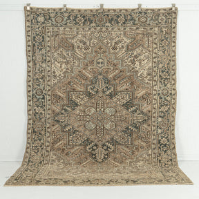 Handmade 6x9 area rug in brown, ideal for a cozy living room, bedroom, dining room