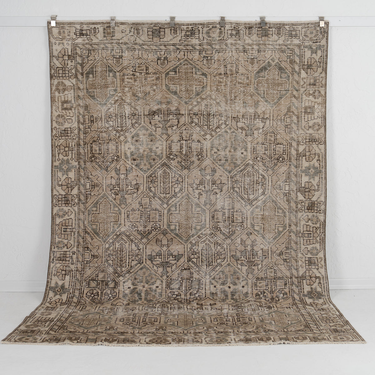 Handmade 7x9 area rug in brown, ideal for a cozy living room, bedroom, office, entryway, kitchen