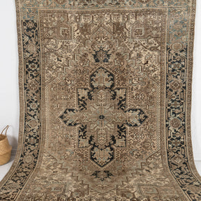 Handmade 7x9 area rug in brown, ideal for a cozy living room, bedroom, office, entryway, dining room