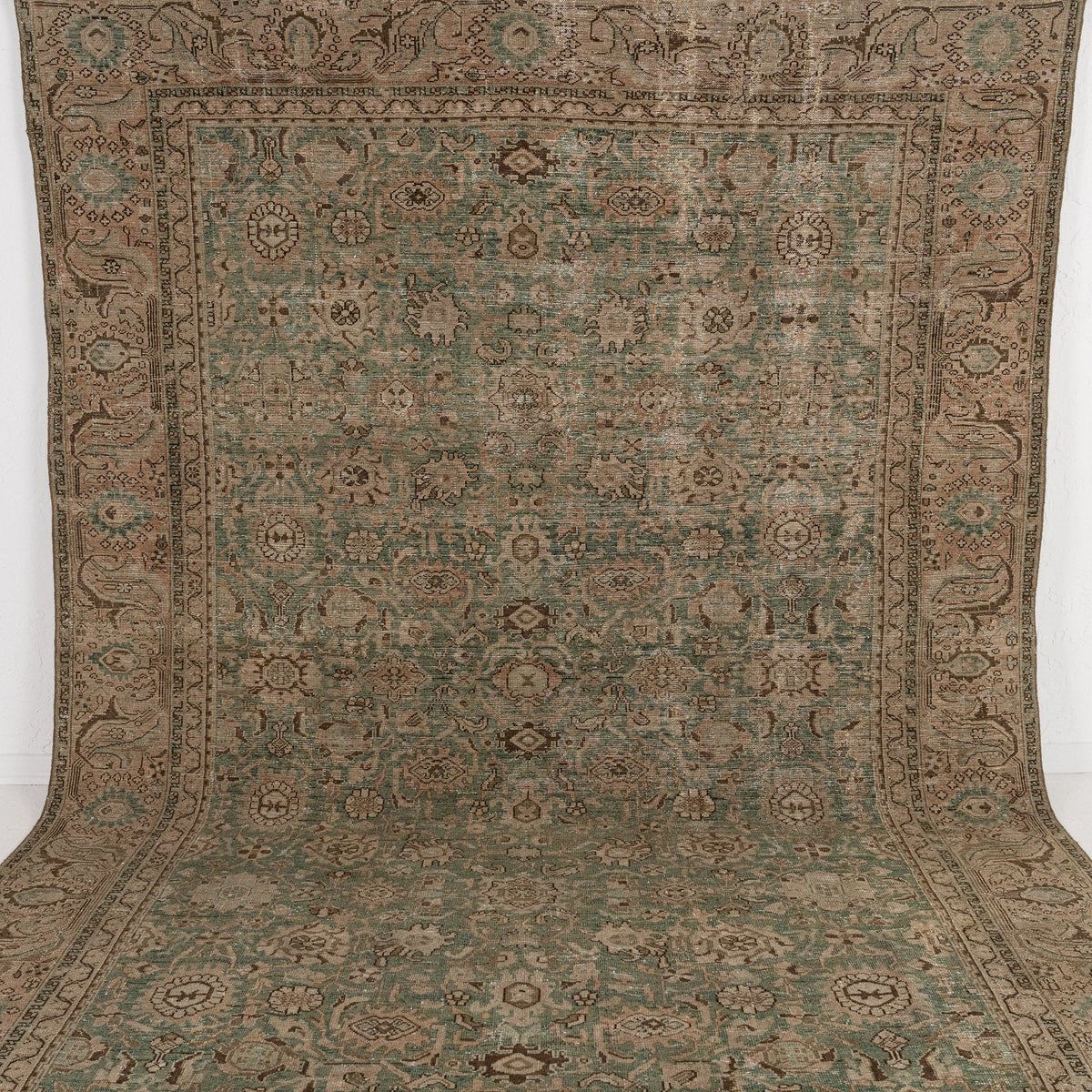 Handmade 8x11 area rug in green, ideal for a cozy living room, bedroom, dining room, office