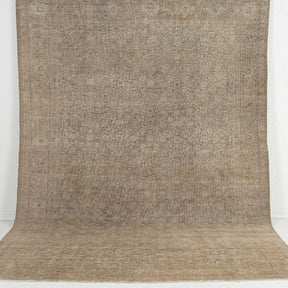 Handmade 7x11 area rug in beige, ideal for a cozy living room, bedroom, office, entryway, kitchen