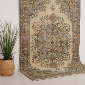 Beige and Green Area Wool Rug