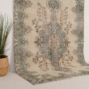 Beige and Green Area Wool Rug