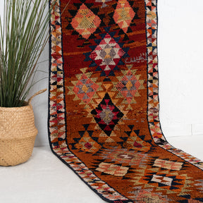 Red and Beige Runner Wool Rug