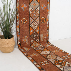 Red and Beige Runner Wool Rug