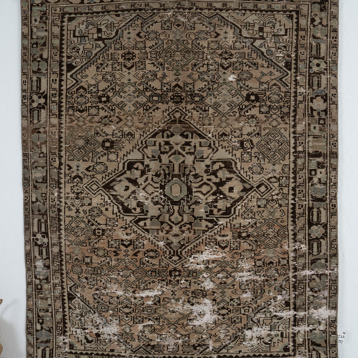 Handmade 5x7 area rug in brown, ideal for a cozy entryway, hallway, living room, kitchen, bedroom