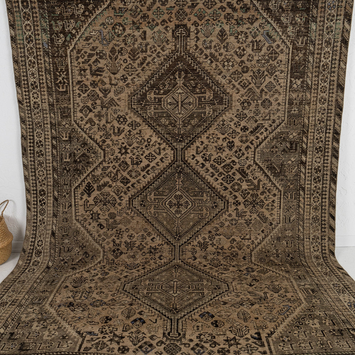 Handmade 7x10 area rug in brown, ideal for a cozy living room, bedroom, office, dining room, kitchen