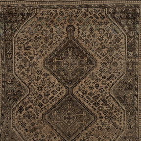 Authentic 7x10 area rug from persian, in subtle brown tones