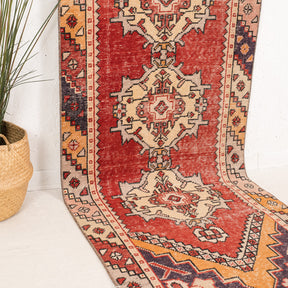 Red and Beige Runner Wool Rug