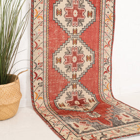 Red and Beige Runner Wool Rug