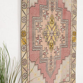 Pink and Beige Area Wool Rug