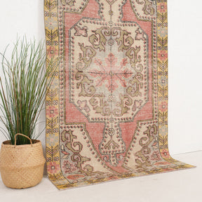 Pink and Beige Area Wool Rug