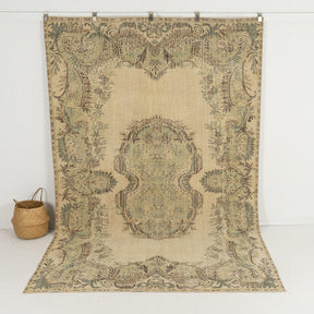 Handmade 6x10 area rug in beige, ideal for a cozy living room, dining room, bedroom, office