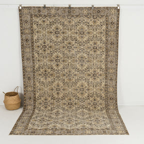 Handmade 6x10 area rug in beige, ideal for a cozy living room, dining room, bedroom, office