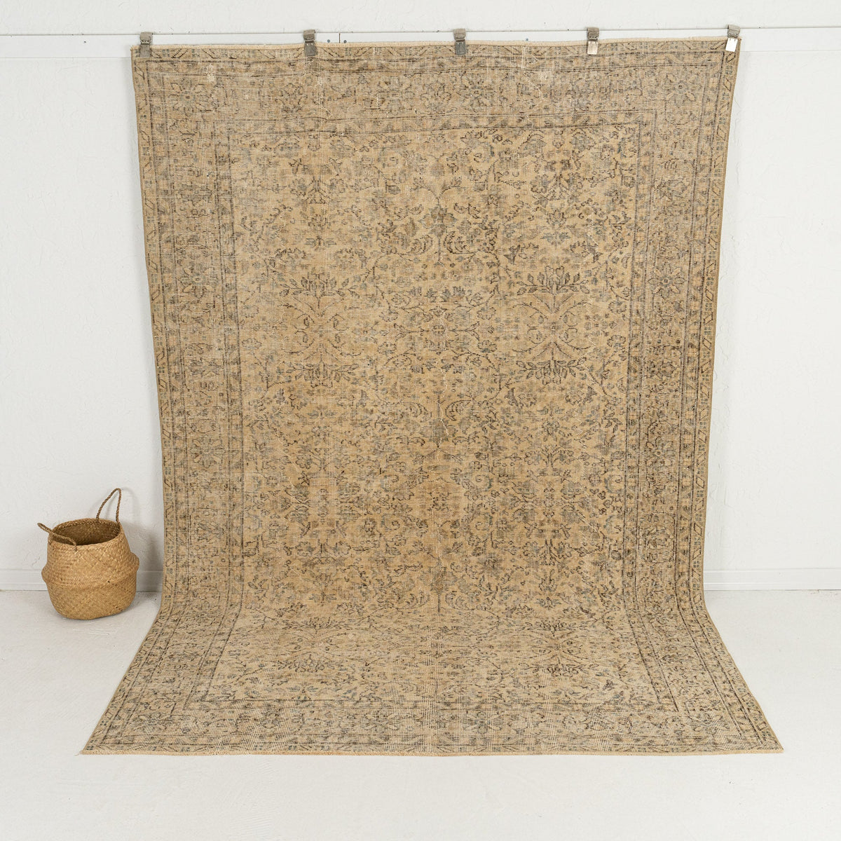 Handmade 7x10 area rug in beige, ideal for a cozy living room, bedroom