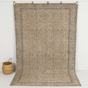 Handmade 6x9 area rug in beige, ideal for a cozy living room, bedroom, dining room