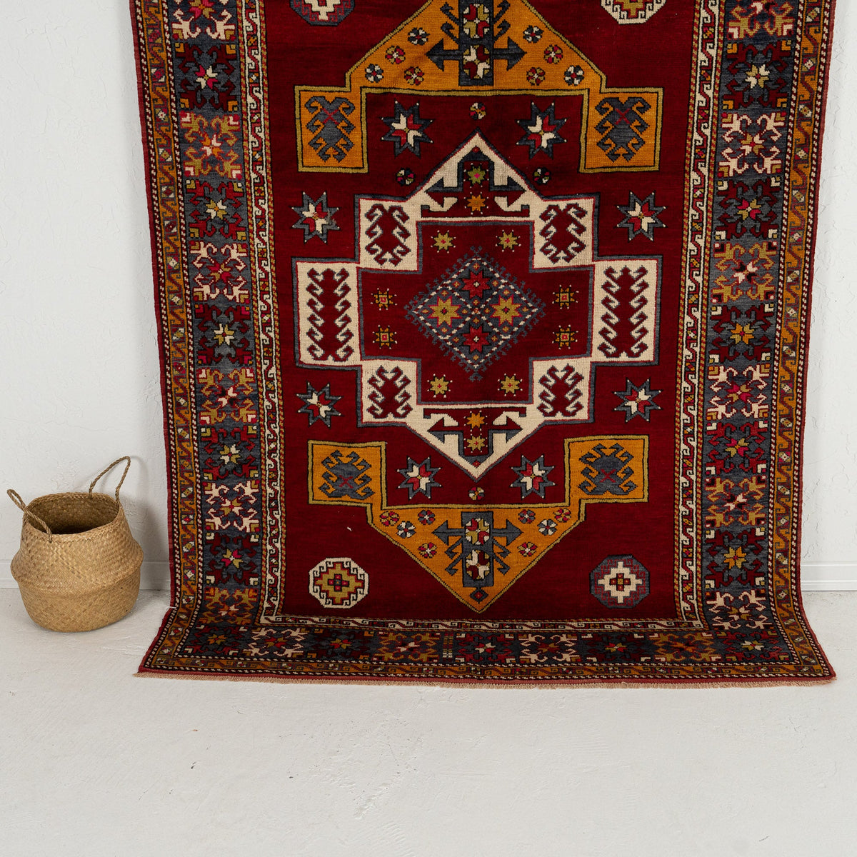 Handmade 6x8 area rug in red, ideal for a cozy bedroom, living room