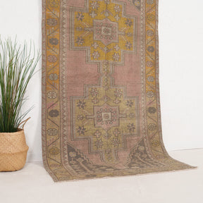 Gold and Pink Area Wool Rug