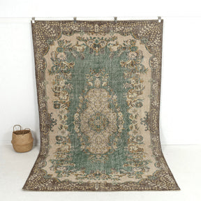 Handmade 6x10 area rug in green, ideal for a cozy living room, bedroom, entryway, office, kitchen & dining