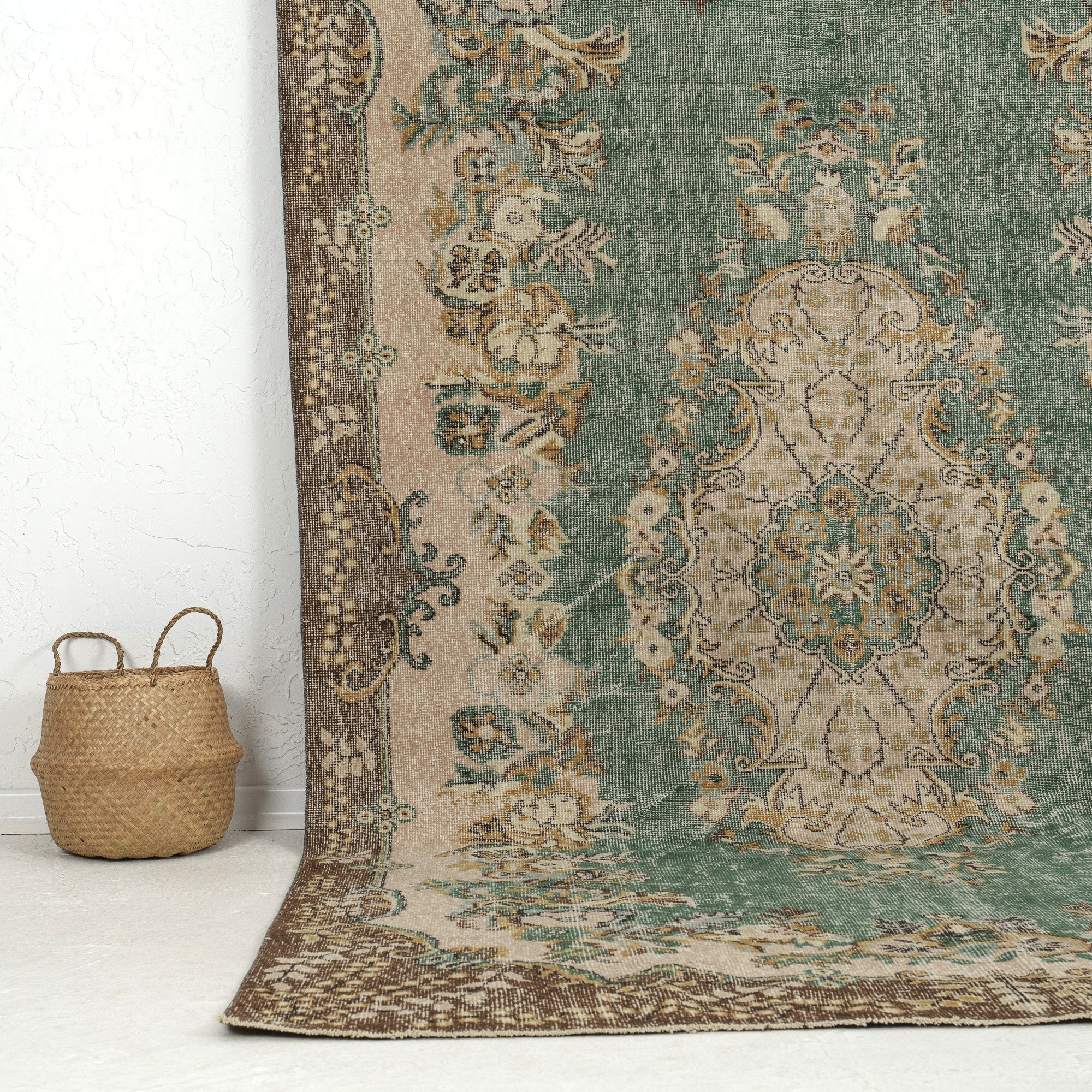Authentic 6x10 area rug from turkish, in subtle green tones