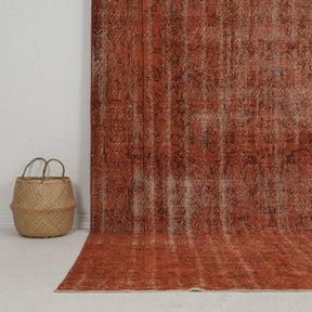 Authentic 7x10 area rug from turkish, in subtle orange tones