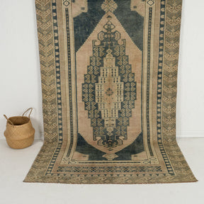 Handmade 5x9 area rug in beige, ideal for a cozy entryway, hallway, living room, kitchen, bedroom