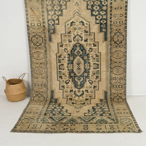 Handmade 5x10 area rug in beige, ideal for a cozy entryway, hallway, bedroom, living room, office