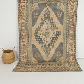 Handmade 5x8 area rug in beige, ideal for a cozy living room, entryway, bedroom, office, dining room