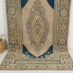 Handmade 5x9 area rug in beige, ideal for a cozy living room, bedroom, entryway, office, dining room