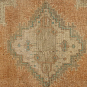 Authentic 5x11 area rug from turkish, in subtle orange tones