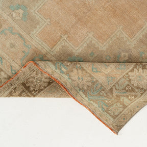 5x11 area rug with beautiful orange hues, from turkish