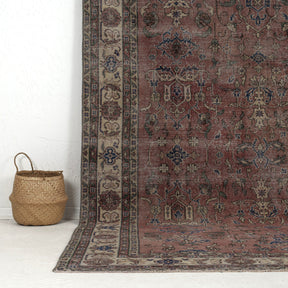 Authentic 7x10 area rug from turkish, in subtle red tones