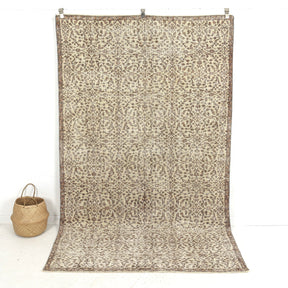 Handmade 5x9 area rug in beige, ideal for a cozy living room, bedroom, entryway, office, kitchen & dining