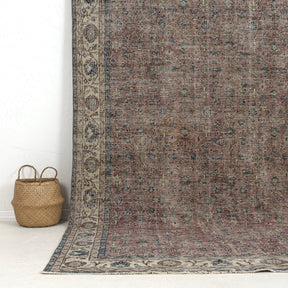 Authentic 7x10 area rug from turkish, in subtle orange tones