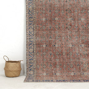 Authentic 5x8 area rug from turkish, in subtle orange tones