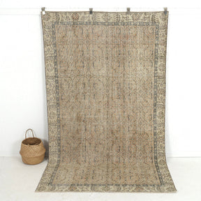 Handmade 5x9 area rug in beige, ideal for a cozy living room, bedroom, entryway, office, kitchen & dining