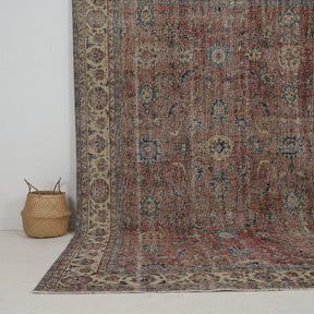 Authentic 7x10 area rug from turkish, in subtle red tones