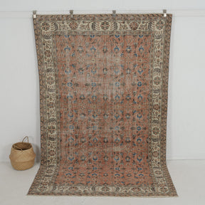 Handmade 6x9 area rug in brown, ideal for a cozy living room, bedroom, dining room, entryway, office