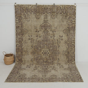 Handmade 7x10 area rug in beige, ideal for a cozy living room, bedroom, dining room, entryway, office