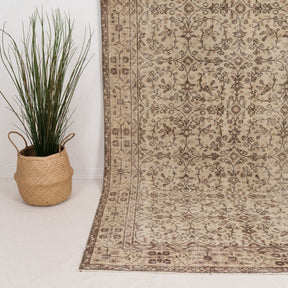 Medium Brown Antique Rug
