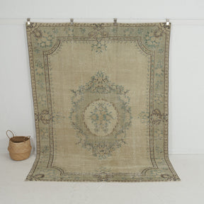 Handmade 7x9 area rug in beige, ideal for a cozy living room, bedroom, dining room, entryway, office