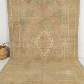 Handmade 6x10 area rug in beige, ideal for a cozy living room, bedroom, dining room, office, entryway