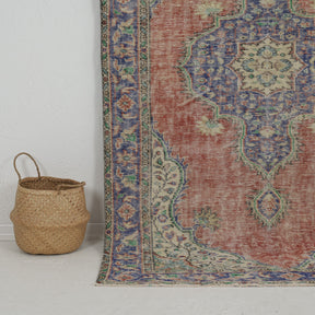 Authentic 5x8 area rug from turkish, in subtle red tones